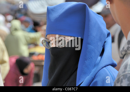 Old woman wearing a niqab veil, Fès, Morocco, Africa Stock Photo