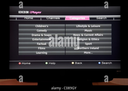 UK, Britain. Flatscreen television showing BBC iPlayer categories available on Freesat Stock Photo