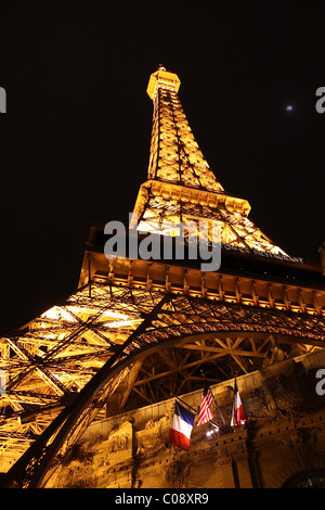 Looking up at the Eiffel Tower replica at the Paris Las Vegas Hotel and Casino at night Stock Photo