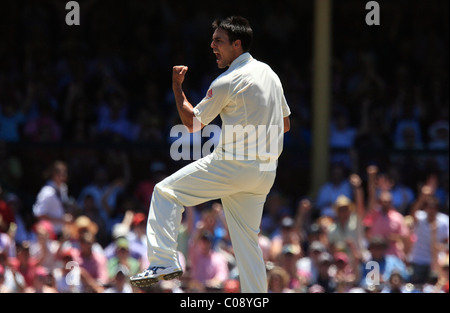 Australian bowler Mitchell Johnson celebrates after taking the wicket of South African batsman Jean-Paul Duminy Stock Photo