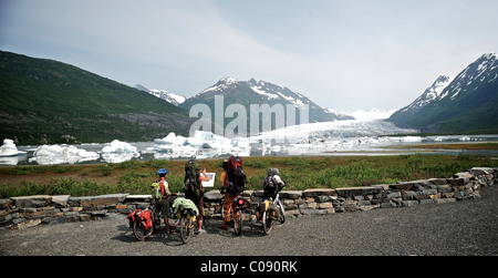 of bicyclists on the trail to Spencer Glacier, Chugach National Forest, Kenai Peninsula, Southcentral Alaska, Summer Stock Photo