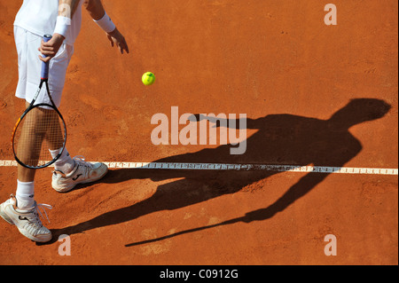 Clay court, tennis, serve, baseline, shadow Stock Photo