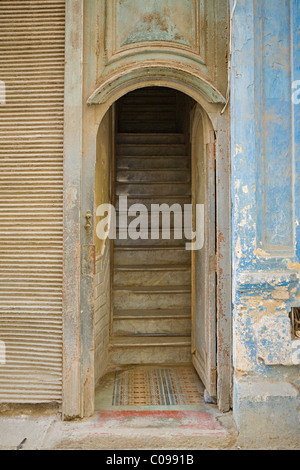 Old traditional door way and staircase to a house in a side street Havana Cuba Stock Photo