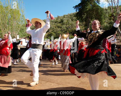 Portuguese folk dancers in traditional costume at the Festa da Fonte Grande May festival in Alte, Algarve, Portugal, Europe Stock Photo