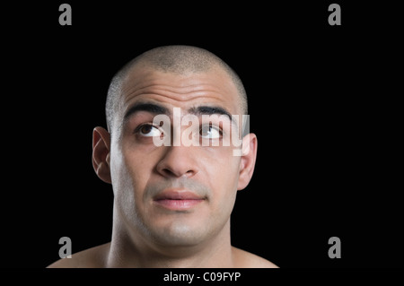 Close-up of a man looking up Stock Photo