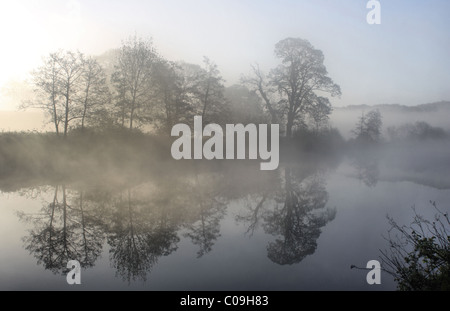 Morning mist on the banks of the river Dee in Eccleston Cheshire Stock Photo