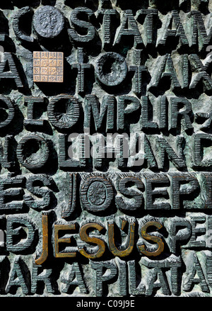 Word Jesus on the front door, portal, Basilica Temple Expiatori de la Sagrada Família, Expiatory Church of the Holy Family, Stock Photo
