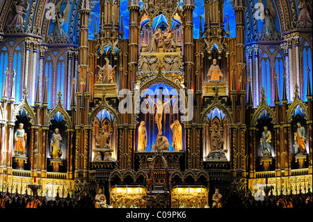 The altar area of the Basilica of Notre Dame in the old town of Montreal, Quebec, Canada Stock Photo