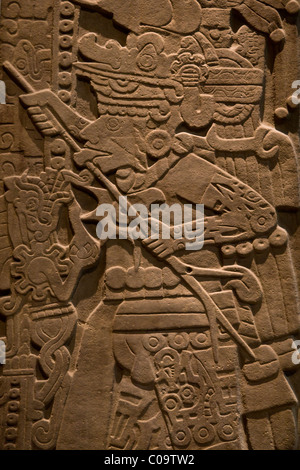 Huastec stone tablet of Huilocintla depicting a priest performing a self blood letting ceremony, National Museum of Anthropology Stock Photo