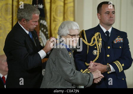 President George Bush awarding Harper Lee with the Presidential Medal of Freedom  The Presidential Medal of Freedom ceremony Stock Photo