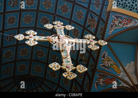 Crucifix suspended from a ceiling in a Roman Catholic cathedral Stock Photo