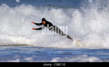 LOCAL SURFER JEFFREYS BAY JEFFREYS BAY  SOUTH AFRICA 22 June 2010 Stock Photo