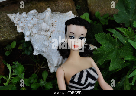 First Barbie doll made in 1959 in Japan, #1 Barbie doll with arched eyebrows, black and white eye paint and matching swimsuit. Stock Photo
