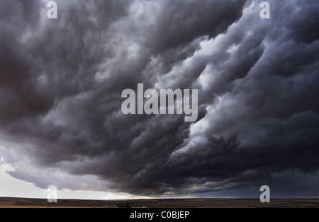 The autumn storm approaches on fields after harvesting Stock Photo