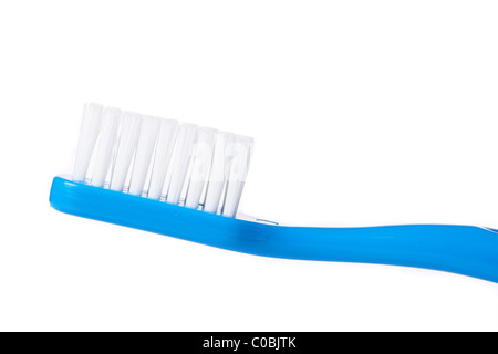 A blue tooth brush on the white background Stock Photo