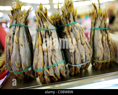 Bundles of dried fish on sale in Moscow food market Stock Photo