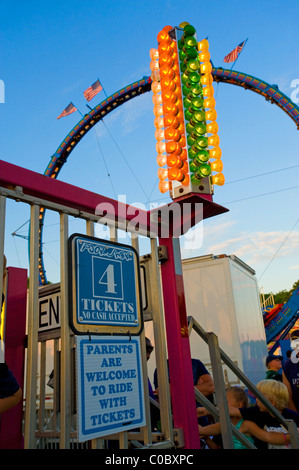 Ticket sale sign and ride at local carnival fair in Indiana Stock Photo