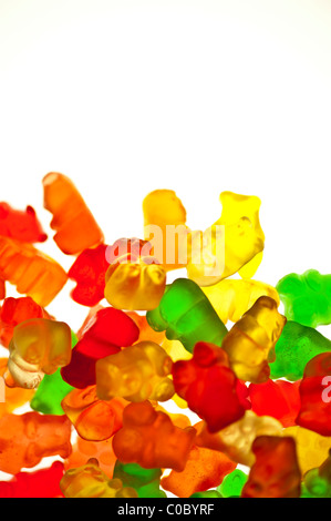 Bright, backlit, Gummi Bears isolated on a white background. Stock Photo