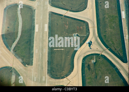 An aerial photograph of a jet taxiing on the tarmac at Atlanta's Hartsfield-Jackson Airport after landing. Stock Photo