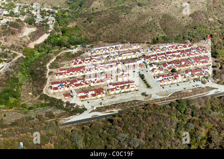 aerial view new Mexican middle class row housing development near Bahias de Huatulco airport Oaxaca state Mexico Stock Photo