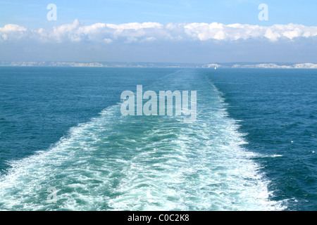 The wash trail in the English Channel from a car ferry traveling between Dover, UK and Calais, France Stock Photo