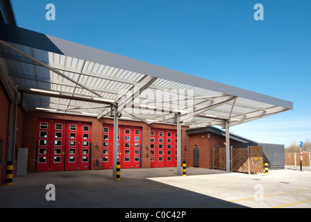 Marshes End Fire Station, Dorset Fire and Rescue Service, Poole fire engine exit doors Stock Photo