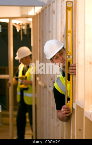 Builders working on building interior Stock Photo