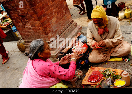 hindu fortune teller and client, peoples lives ( the nepalis ) , life in kathmandu , kathmandu street life , nepal Stock Photo