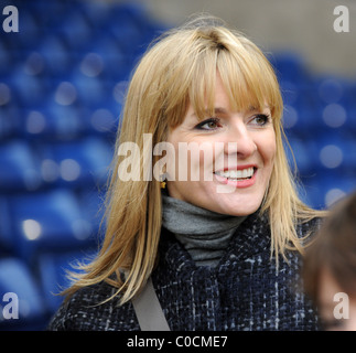 BBC television sports presenter Gabby Logan at football match Stock Photo