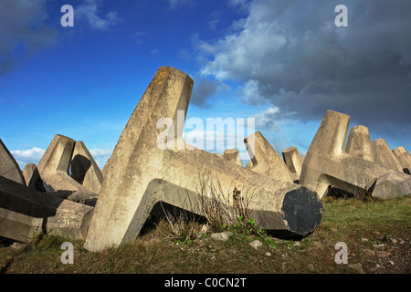 Pre-cast concrete sea defences on the vulnerable North Wales coast at Llanddulas near Abergele Stock Photo
