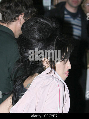 Amy Winehouse leaving 'The Good Mixer' in Camden, looking worse for wear and wearing a pendant with a picture of her Stock Photo