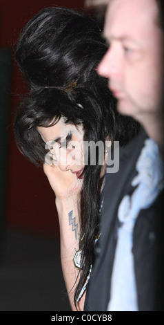 Amy Winehouse leaving 'The Good Mixer' in Camden, looking worse for wear and wearing a pendant with a picture of her Stock Photo