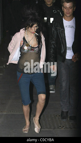 Amy Winehouse leaving 'The Good Mixer' in Camden, looking worse for wear and wearing a pendant with a picture of her Stock Photo