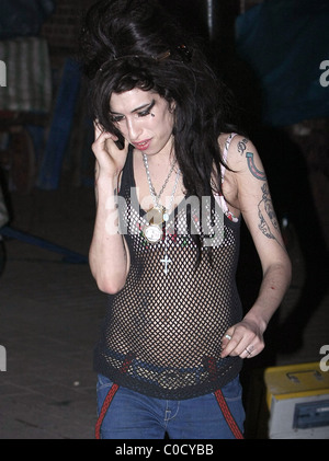 Amy Winehouse leaving 'The Good Mixer' in Camden, looking worse for wear and wearing a pendant with a picture of her Stock Photo