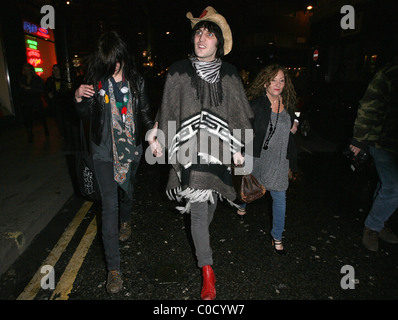 Noel Fielding leaving the Groucho club, wearing a bizarre outift, with Alison Mosshart, from 'The Kills' London, England - Stock Photo