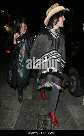 Noel Fielding and Alison Mosshart from 'The Kills' leave the Nobby Clark Shoots Noel Fielding - private view, held at Maison Stock Photo