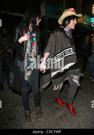 Noel Fielding and Alison Mosshart from 'The Kills' leave the Nobby Clark Shoots Noel Fielding - private view, held at Maison Stock Photo