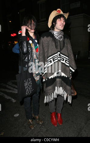 Noel Fielding and Alison Mosshart from 'The Kills' leave the Nobby Clark Shoots Noel Fielding - private view, held at Maison Stock Photo