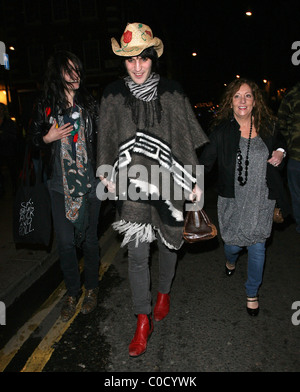 Noel Fielding and Alison Mosshart from 'The Kills' leave the Nobby Clark Shoots Noel Fielding - private view, held at Maison Stock Photo