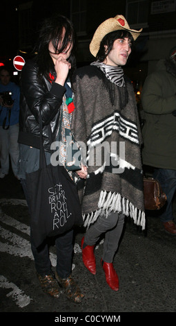 Noel Fielding and Alison Mosshart from 'The Kills' leave the Nobby Clark Shoots Noel Fielding - private view, held at Maison Stock Photo