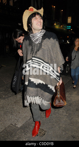 Noel Fielding and Alison Mosshart from The Kills leave the 'Nobby Clark Shoots Noel Fielding - private view' held at Maison Stock Photo