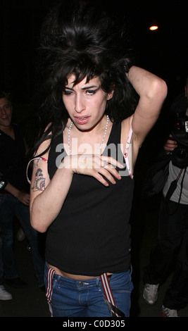 Amy Winehouse goes on another late night bender in Camden visiting the same pub, 'The Good Mixer' as the night before. She Stock Photo