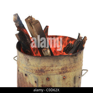 Brazier burning waste wood Stock Photo