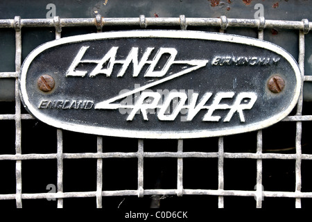 A close up of the Land Rover symbol badge on the front grill of a Land Rover. Stock Photo