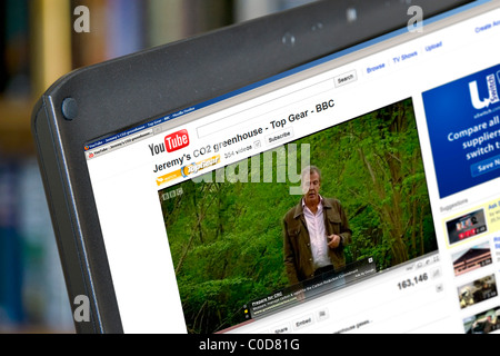 Watching a YouTube video on a laptop computer, UK Stock Photo