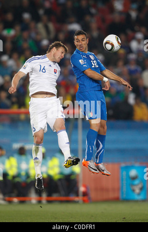Jan Durica of Slovakia (l) and Fabio Quagliarella of Italy (r) contest a header during a 2010 World Cup Group F match June 24. Stock Photo