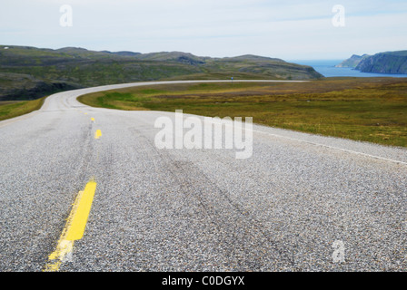 Norwegian road running to the fiord Stock Photo