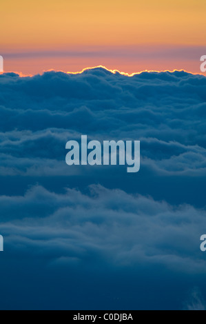 Sunset clouds from Haleakala National Park, Maui, Hawaii. Stock Photo