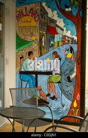Mural showing a couple eating ice cream at an outdoor cafe, Bellingham, Washington State, USA Stock Photo