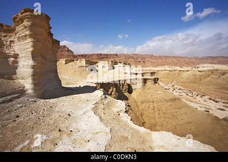 Natural canyons, bluffs and cliffs of sandstone in the desert near the Dead Sea in Israel Stock Photo